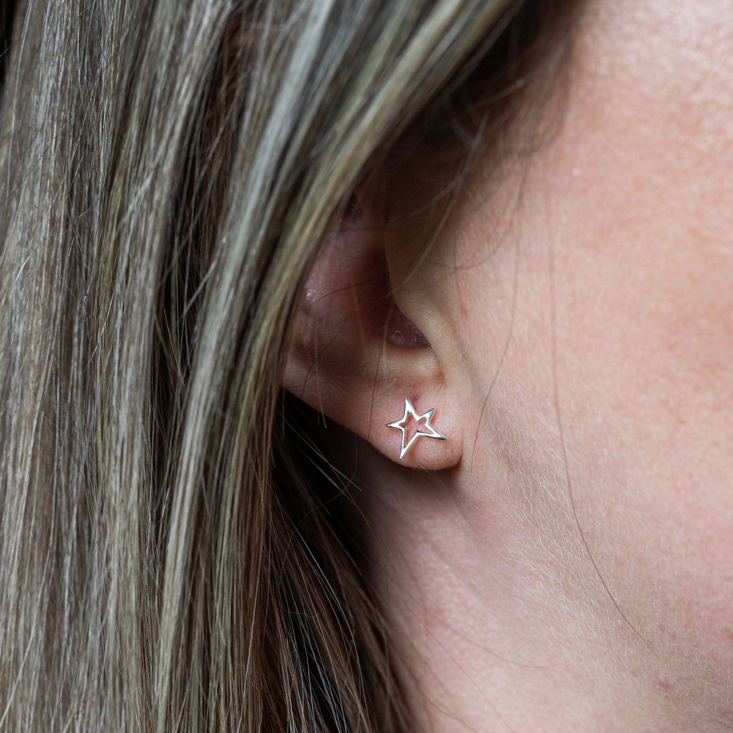 Vela Hollow Star Stud Earrings