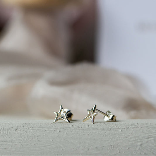Vela Hollow Star Stud Earrings